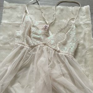 White lingerie with pink reflexes